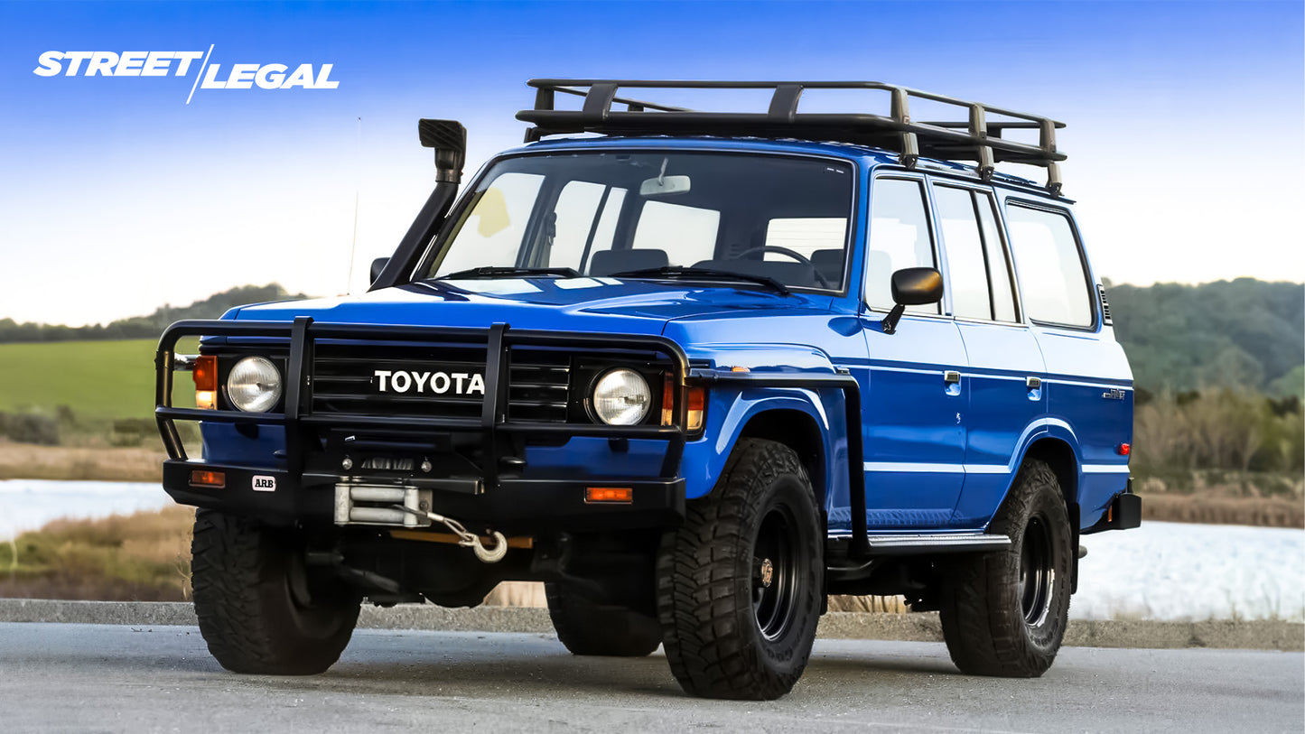 Toyota FJ60 Land Cruiser on rocky trail