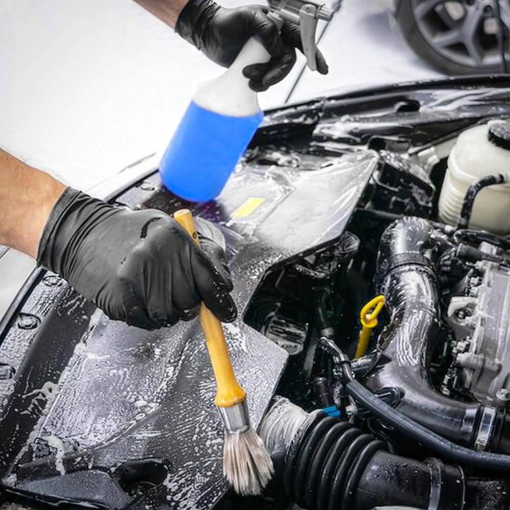 
                      
                        Car engine cleaning with Blue Beast Degreaser applied using a brush and spray bottle.
                      
                    